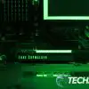 The Seagate Lightsaber Legends Special Edition FireCuda PCIe Gen4 NVMe SSD installed in a computer with green RGB LEDs lit