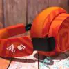 Side view of the Skullcandy x Doritos SLYR wired gaming headset.